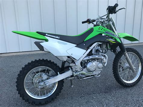 Kawasaki 140 dirt bike - The 2014 Kawasaki KLX 140 is a versatile dirt bike with a sophisticated character. It is propelled by a four-stroke, SOHC, two-valve, single cylinder engine with a displacement of 144cc.